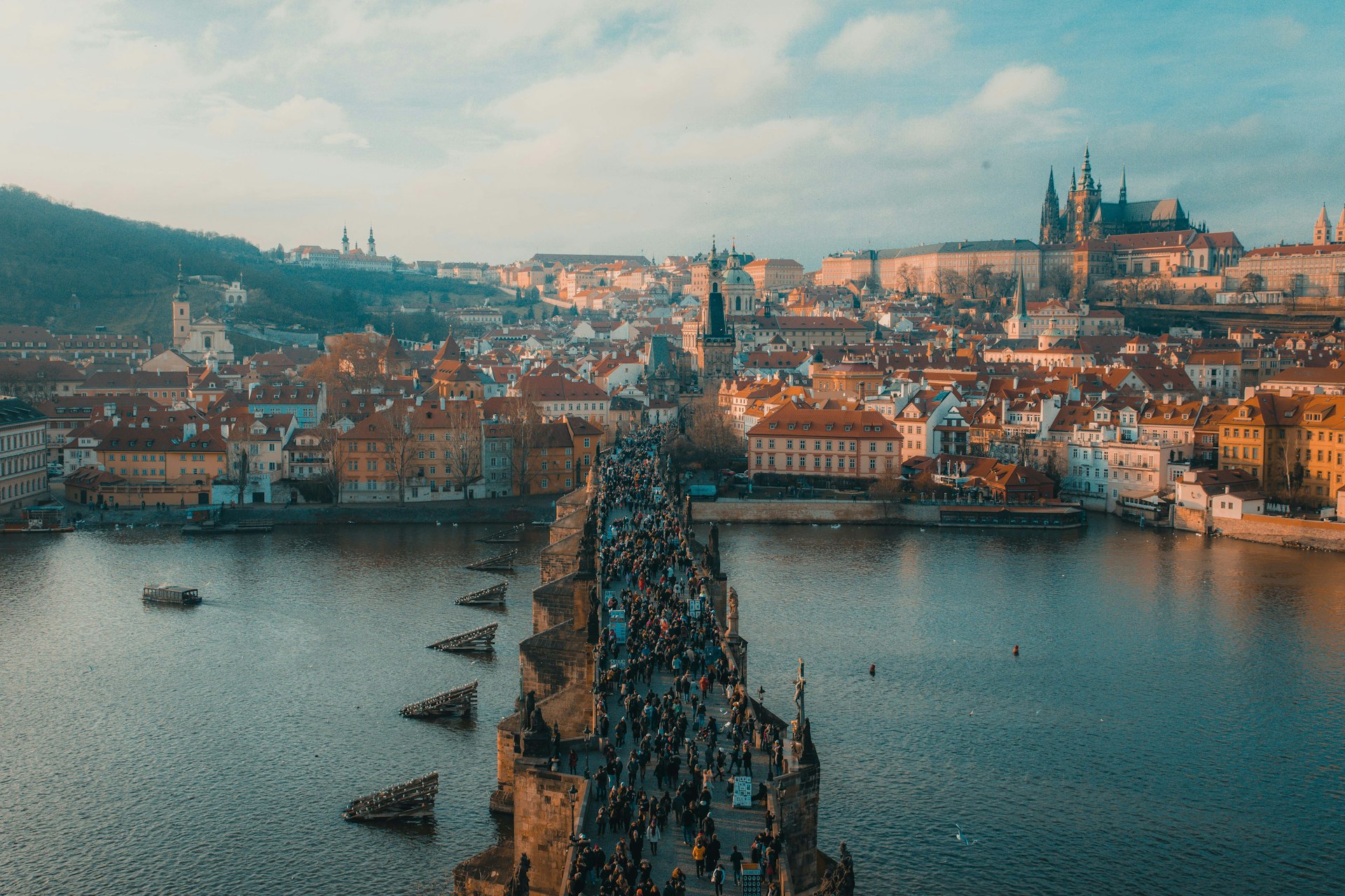 Aerial view of a city bridge and waterfront during a civic event day